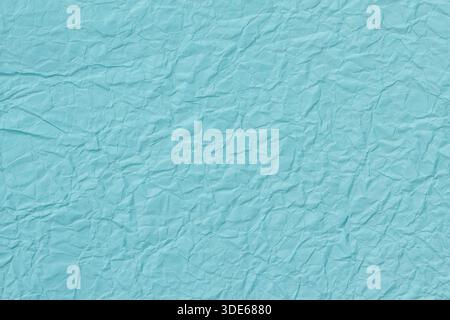 Crumpled Blue Paper Texture with Wrinkles and Creases Abstract Background Stock Photo