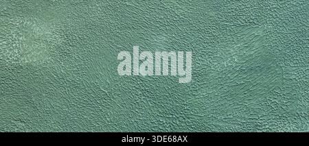 Turquoise Mint Green Painted Wall Texture with Rough Brushstroke Pattern Close-Up Background Stock Photo