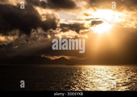 Dramatic sunset over the mountains of Alaska. Stock Photo