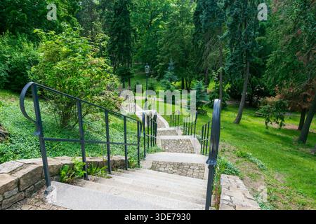 Scenic Stone Steps and Pathway Winding Through the Lush Green Terraces of Havlíčkovy Sady (Grébovka Park), Prague, Czech Republic Stock Photo