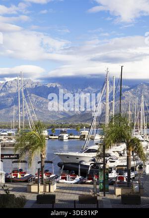 Calvi marina, with the mountains of the Balagne region in the Haute-Corse department, Corsica, France Stock Photo