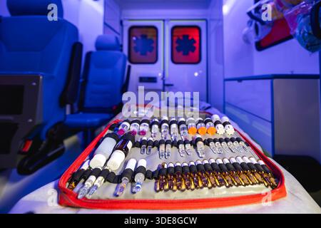 Close-up of ampoules with medication in ambulance car of emergency medical service. Stock Photo