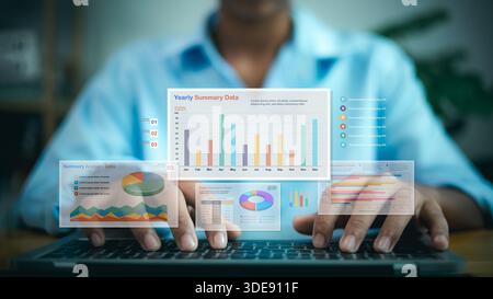 Close up of businessman hands using laptop with virtual holographic charts and graphs. Concept of data analysis, financial report, business intelligen Stock Photo
