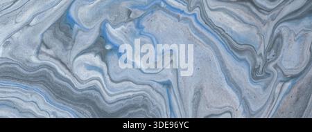 Abstract fluid art background with silver, blue marble texture. Liquid light gray acrylic painting backdrop. Stock Photo