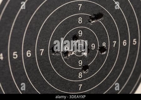 Close up of a shooting target and bullseye with bullet holes Stock ...