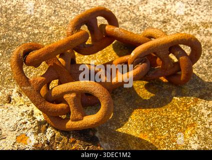 Rusty Large link chain wall art Stock Photo
