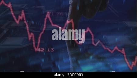 Tapping man's right index finger, forearm in dark sleeve at high-tech display, with red graph 42 Stock Photo