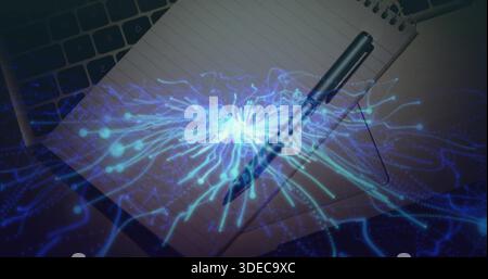 Showing spiral notebook with metal pen on desk featuring laptop keys, phone edge, blue AI overlay Stock Photo