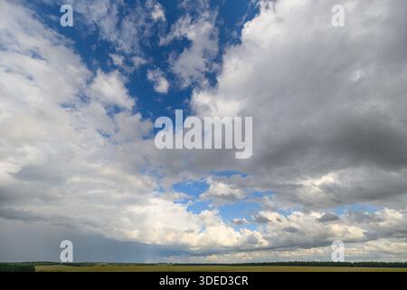 A breathtakingly stunning view of the sky showcasing intricate and captivating cloud patterns, with vibrant blue areas Stock Photo