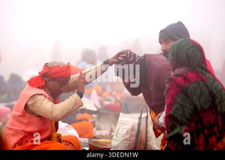 Perform Rituals Hindu devotees perform rituals on the occasion of Mahalaya, an ...