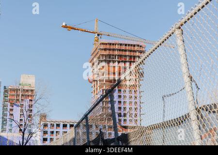 New York City, Brooklyn, USA - February 18, 2023: Building under construction near Coney Island attractions on a winter day Stock Photo