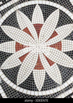 Brown, white and black color vintage decorative mosaic floor tiles Stock Photo
