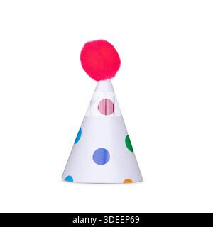 White party hat featuring colorful polka dots and a vibrant pink pompom, celebrating special occasions. Side view. Ideal for cutout and use as photo p Stock Photo