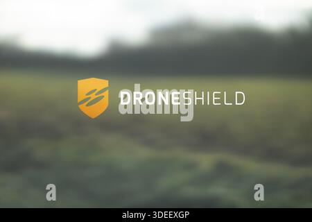DroneShield on a window vehicle. Drone Shield brand in a test field. Stock Photo