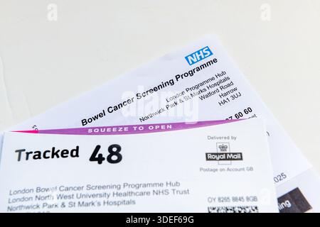 London. UK- January 05.2026. The information letter and pre paid return envelope of a bowel cancer screening programme home self test kit. Stock Photo
