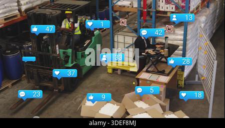 Operating green forklift worker wearing PPE moving boxes at warehouse, lead using laptop blue icons Stock Photo