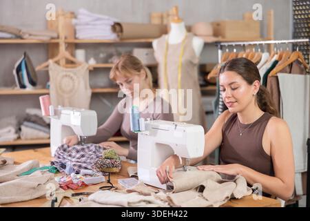 Two female tailors working in the workshop Stock Photo