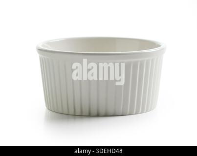 new empty small baking cup isolated on white background Stock Photo