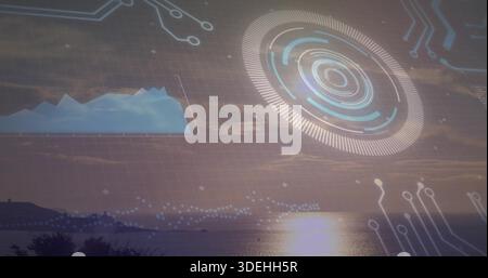 Showing centered sunset sun low on horizon reflecting over water displaying HUD overlay, radar grid Stock Photo