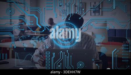 Typing central man wearing plaid shirt working on laptop in coworking area with coffee, HUD Stock Photo