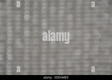 Out of focus grayish background with circle. Metallic backdrop. Stock Photo