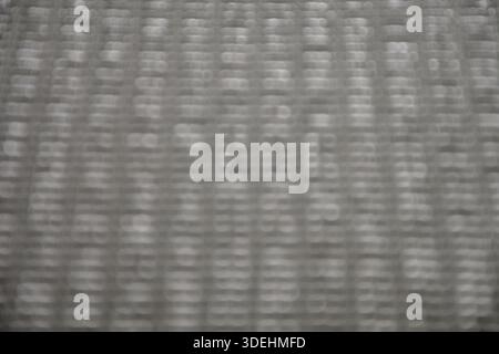 Out of focus grayish background with circle. Metallic backdrop. Stock Photo