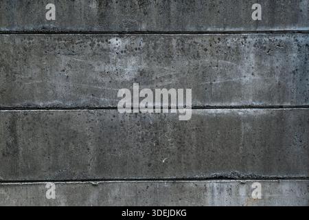Horizontal concrete panels background. Textured grey cement wall with seam lines, industrial minimalist architecture for modern design Stock Photo