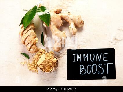 Fresh ginger on a light background. Dry ginger. Sliced ​​ginger, ginger root. Top view. Traditional alternative medicine for immunity. Stock Photo