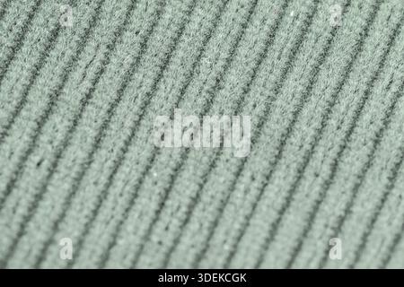 Green turquoise textured corduroy fabric patterns closeup as textile background Stock Photo