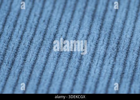 Blue textured corduroy fabric patterns closeup as textile background Stock Photo