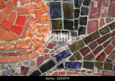 Mosaic pattern of multicolored tiles on the wall Stock Photo