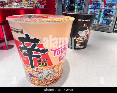 Lotte Mart Express retail, two tables design in cup noodle. Interesting concept to attract people who love the korea culture. Great unique concept. Stock Photo