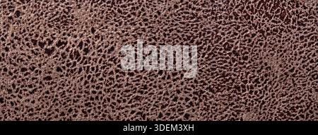 Textured dark brown upholstery textile background with abstract patterned fabric surface, macro backdrop. Stock Photo