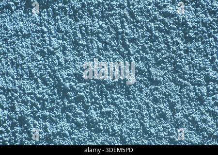 Blue color plaster house wall surface texture closeup as background Stock Photo