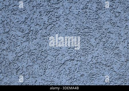 Blue painted plastered facade house wall as background Stock Photo