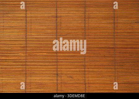 Brown reed mat texture closeup as background Stock Photo