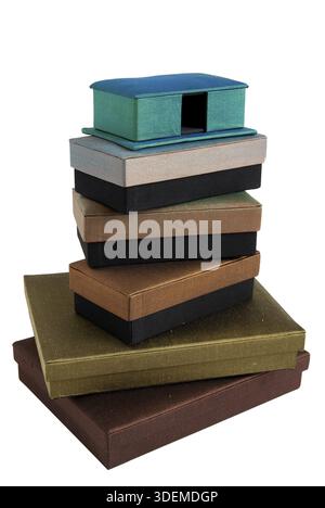 Stacked silk gift boxes isolated on white background Stock Photo