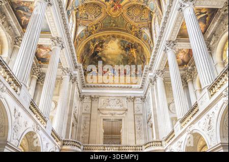 Interior view of the magnificent nave of the baroque palace chapel (Chapelle Royale) with the rhythmically arranged white Corinthian columns, the deco Stock Photo