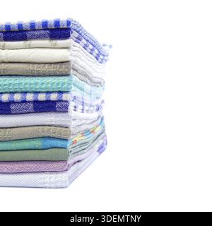 Pile of linen kitchen towels over white copy space for text. colorful dish towels on white background Stock Photo