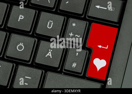 Enter key on Keyboard, Keypad with Heart shape and arrow symbol. concept of online dating and looking for love. Copy space for text Stock Photo