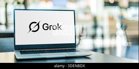 POZNAN, POL - AUG 24, 2025: Laptop computer displaying logo of Grok, a generative artificial intelligence chatbot developed by xAI Stock Photo