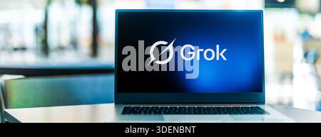POZNAN, POL - AUG 24, 2025: Laptop computer displaying logo of Grok, a generative artificial intelligence chatbot developed by xAI Stock Photo