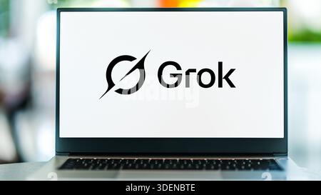 POZNAN, POL - AUG 24, 2025: Laptop computer displaying logo of Grok, a generative artificial intelligence chatbot developed by xAI Stock Photo