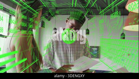Holding central man in plaid shirt reading printed documents at office table, with green HUD Stock Photo