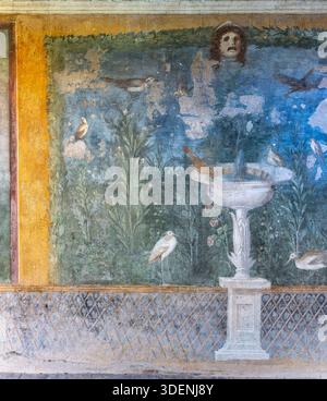 Exquisite frescoes at the House of Venus in the Shell (Casa della Venere in Conchiglia). With fresco illustrations of flowers, trees and birds. Stock Photo