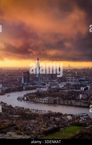 Moody sunset view with clouds and sunlight of the London cityscape, England Stock Photo