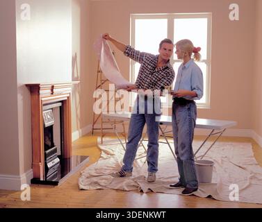 Decorating couple decoration home. Stock Photo