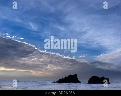 WA26948-00.....WASHINGTON - Approaching storm front, Ruby Beach in Olympic National Park.. Stock Photo