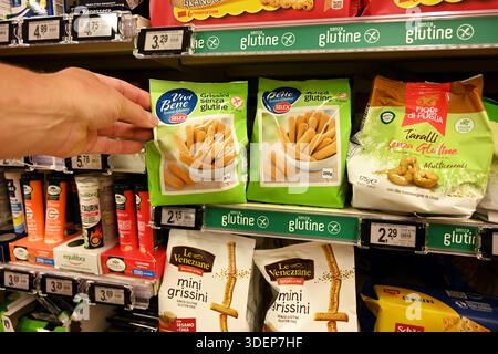 Gluten free grissini breadsticks in a store Stock Photo
