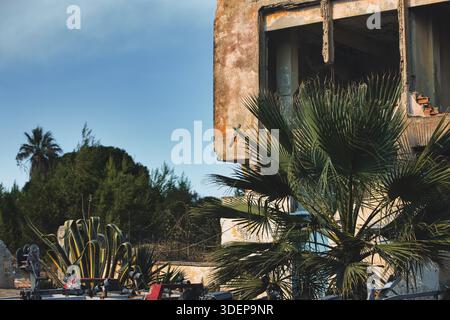 Abandoned building in Vlora, Albania, photographed on August 25, 2025. The crumbling concrete structure with exposed bricks Stock Photo